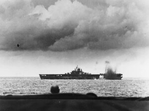 1280px-USS_Bunker_Hill_(CV-17)_is_near-missed_by_a_Japanese_bomb_during_the_Battle_of_the_Phil...jpg