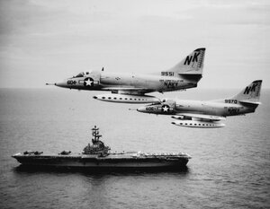 A-4C_Skyhawks_of_VA-146_fly_past_USS_Kearsarge_(CVS-33)_in_the_South_China_Sea_on_12_August_19...jpg