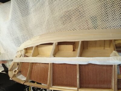 Varnishing underside of planking-2.jpg