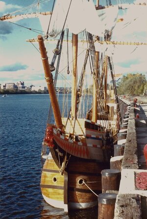 Half Moon at Albany Yacht Club dock -Albany skyline in distance c.1989.jpg