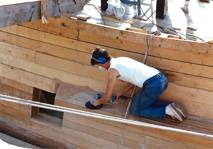 Sanding the main port channel of Half Moon -May 1989.jpg