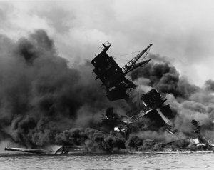 1280px-The_USS_Arizona_(BB-39)_burning_after_the_Japanese_attack_on_Pearl_Harbor_-_NARA_195617...jpg