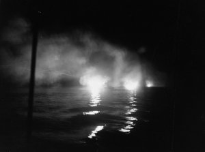 1280px-USS_Helena_(CL-50)_firing_during_the_Battle_of_Kula_Gulf,_6_July_1943_(80-G-54553).jpg
