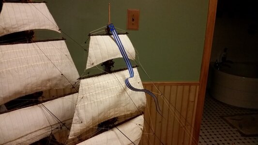 1341 Attach Pennant and Glue to Rigging With Small Spots of Glue.jpg