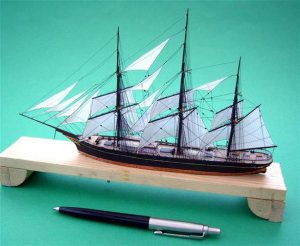 Rigging a miniature tea clipper with wire.JPG