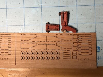 1329 Original Laser Cut Carriages next to Modified Ones.jpg