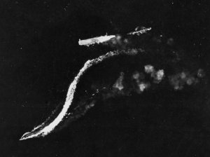 Aerial_view_of_the_immobile_Japanese_carrier_Ryujo_with_two_destroyers_during_the_Battle_of_th...jpg