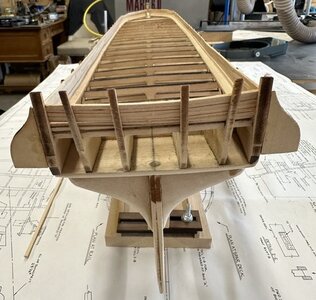 I adjusted the inner bulwark planking to match the camber of the deck later