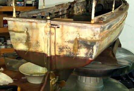 a war ravaged and weathered boat.jpg
