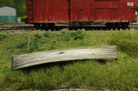 Salvaged boat in the weeds.JPG