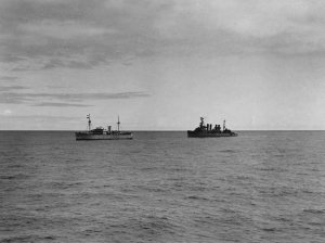 1280px-USS_Omaha_(CL-4)_with_German_blockade_runner_Odenwald,_6_November_1941_(NH_49935).jpg