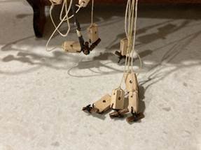 A group of wooden objects from strings Description automatically generated A group of wooden objects from strings Description automatically generated
