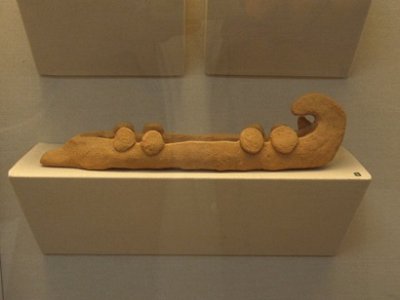 ancient clay model of a greek war ship.jpg