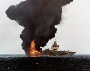 1280px-USS_Enterprise_(CVN-65)_burning,_stern_view.jpg