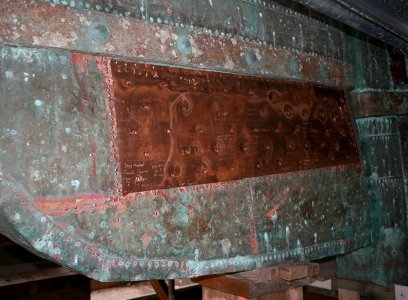 A piece of copper installed on the ship’s rudder where the ceremonial “first piece” was remove...jpg