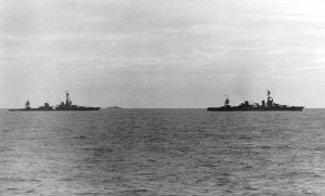 USS_Louisville_(CA-28)_tows_USS_Chicago_(CA-29)_during_the_Battle_of_Rennell_Island_on_30_Janu...jpg