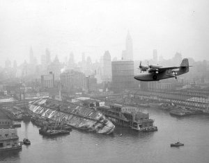 J4F_Widgeon_flies_over_wreck_of_Lafayette_in_New_York_1943.jpg