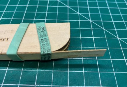 Gluing the bits.jpeg Gluing the bits.jpeg