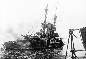 1024px-HMS_Irresistible_abandoned_18_March_1915.jpg