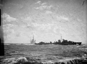 HMS_Jaguar_dropping_depth_charges_1940_IWM_A868.jpg