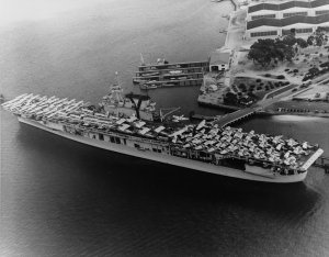 1024px-USS_Yorktown_(CV-5)_embarking_aircraft_at_Naval_Air_Station_North_Island,_in_June_1940_...jpg