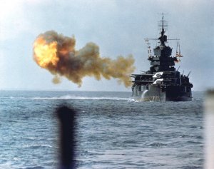 1024px-New_Mexico_class_battleship_bombarding_Okinawa.jpg