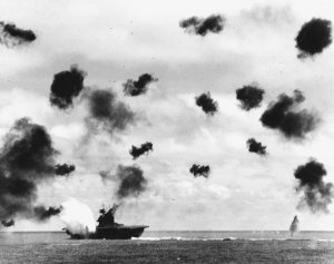 1024px-USS_Yorktown_(CV-5)_is_hit_by_a_torpedo_on_4_June_1942.jpg