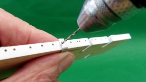 Drilling portholes.jpg